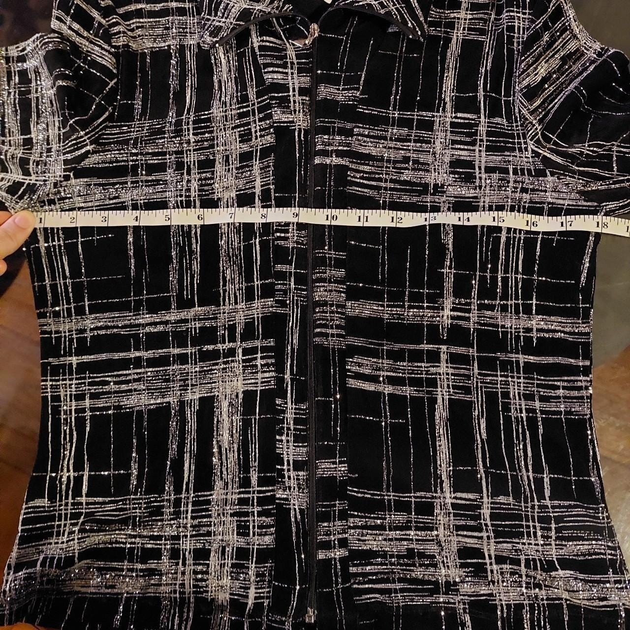 Vintage made in Canada black and silver zip up. It is slightly sheer and stretch