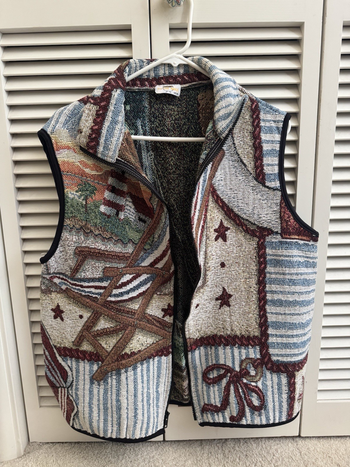 To the Max USA vintage vest features a tapestry-style patchwork design