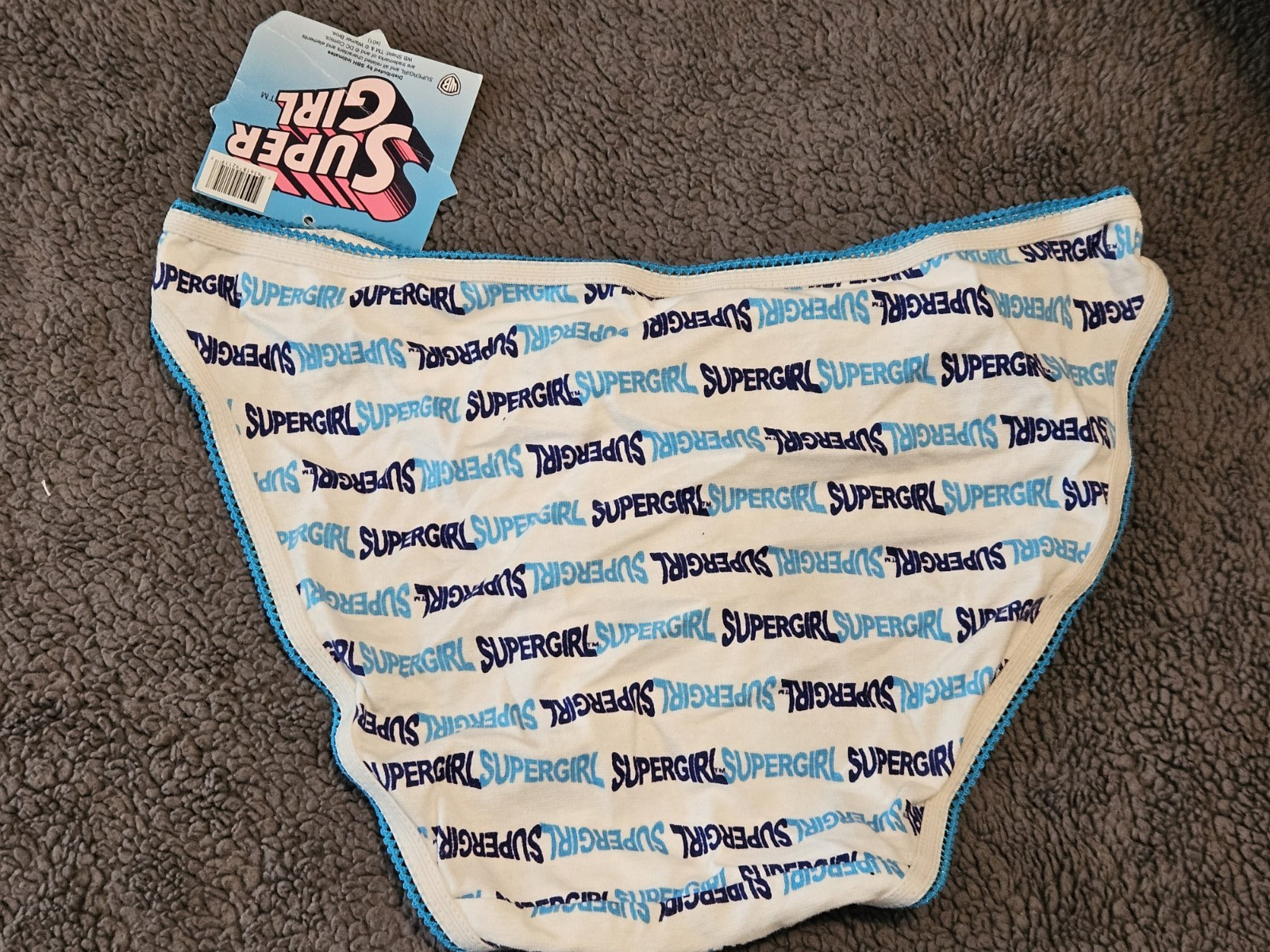 SuperGirl Intimates Women’s Bikini Panties Sz: SMALL Color: WHITE/BLUE WRITING