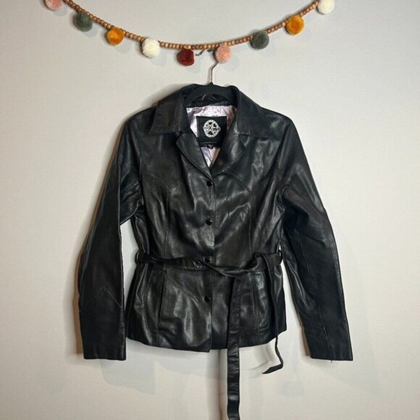 Vintage Wilson’s black leather belted jacket