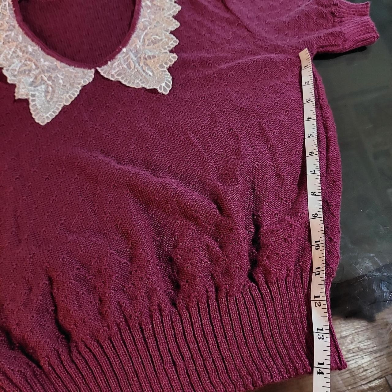 Vintage short sleeve reddish purple sweater with lace collar detail.