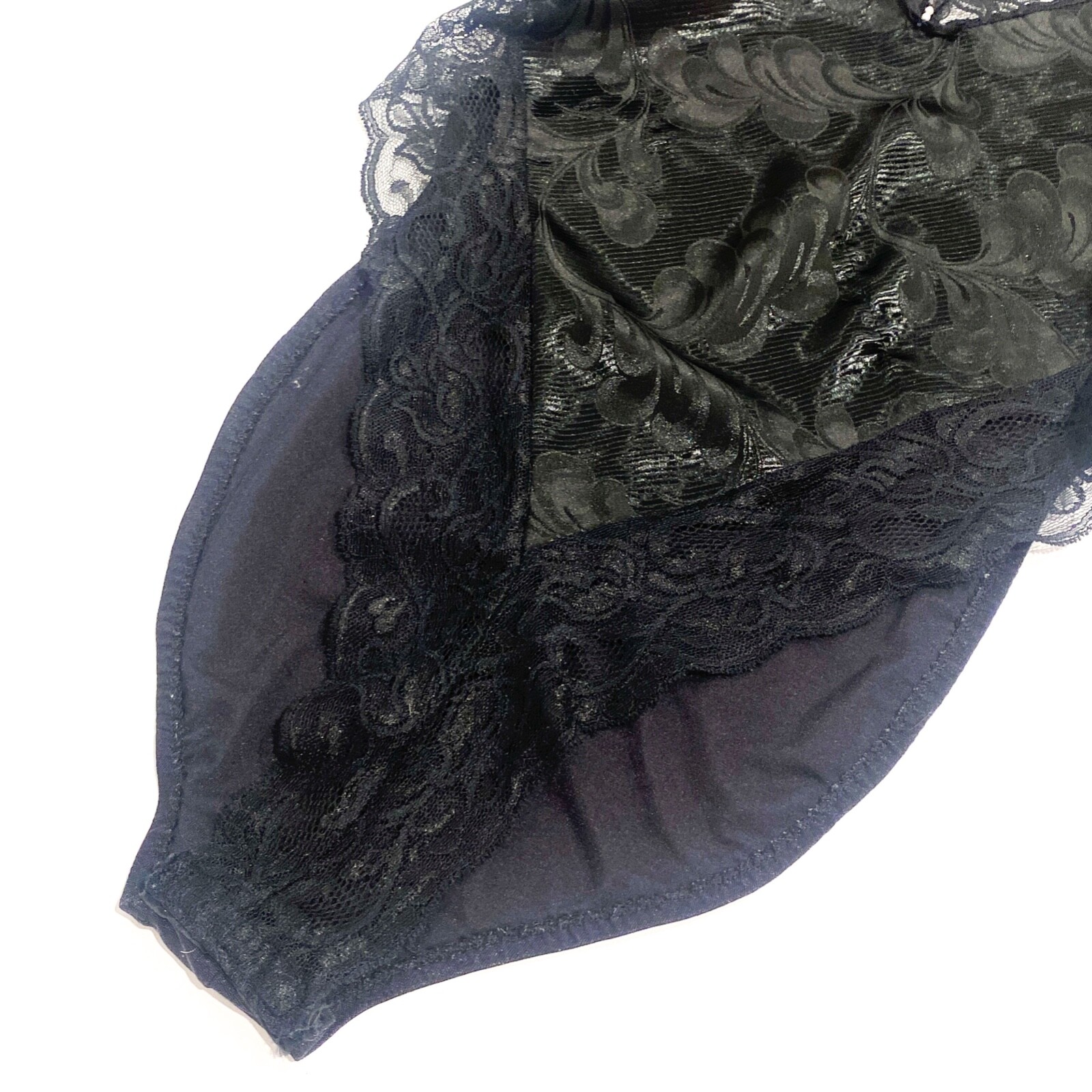 Vintage Lingerie. Black with lace trim and floral print on fabric. Thin spaghett
