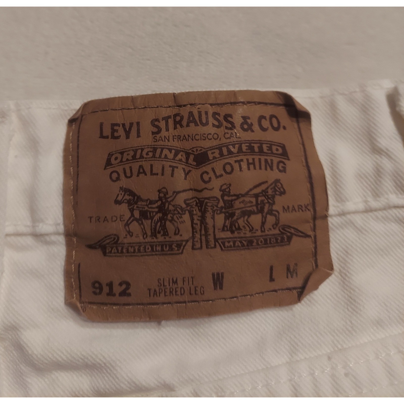 Levis Womens 90s Vintage 912 White Denim High Rise Jeans Made in USA Size 26/30