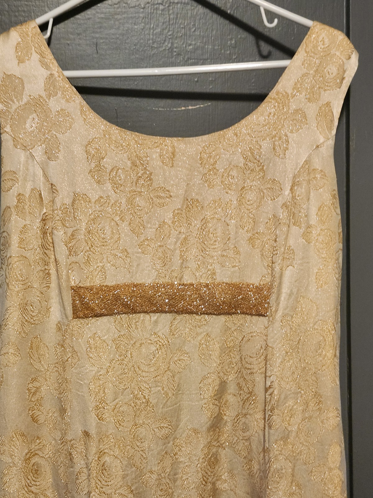 1960s gold floral brocade maxi dress featuring a scoop neckline Size S