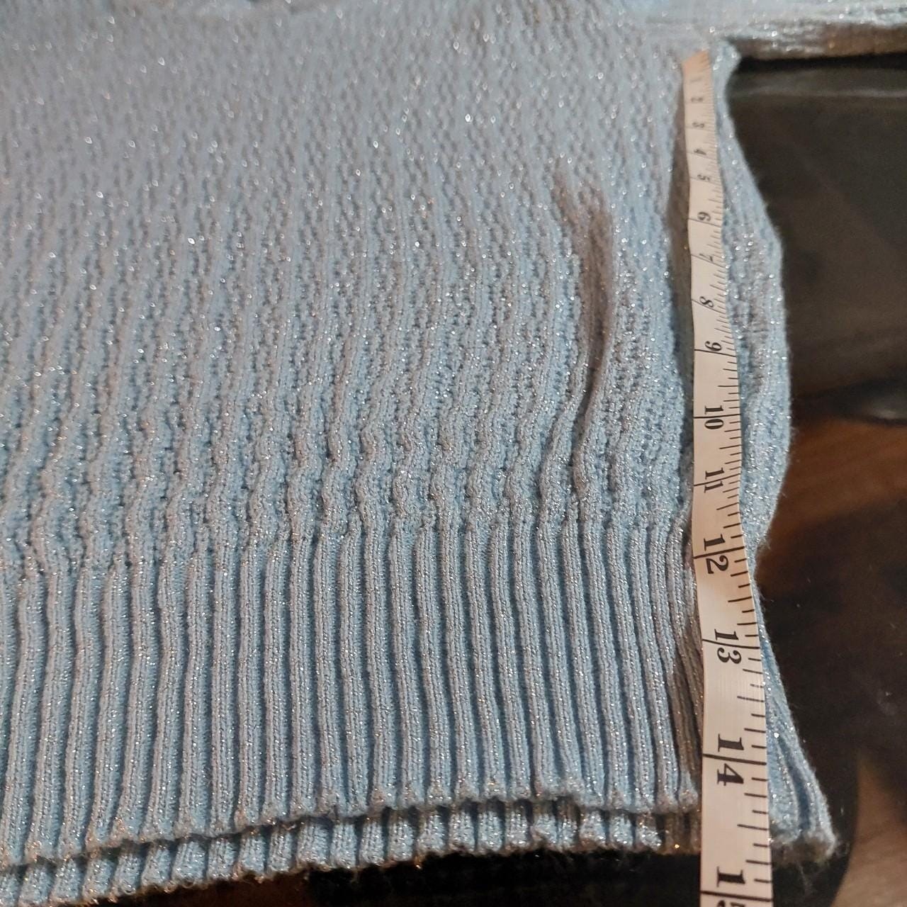 Vintage baby blue and silver metallic sweater.