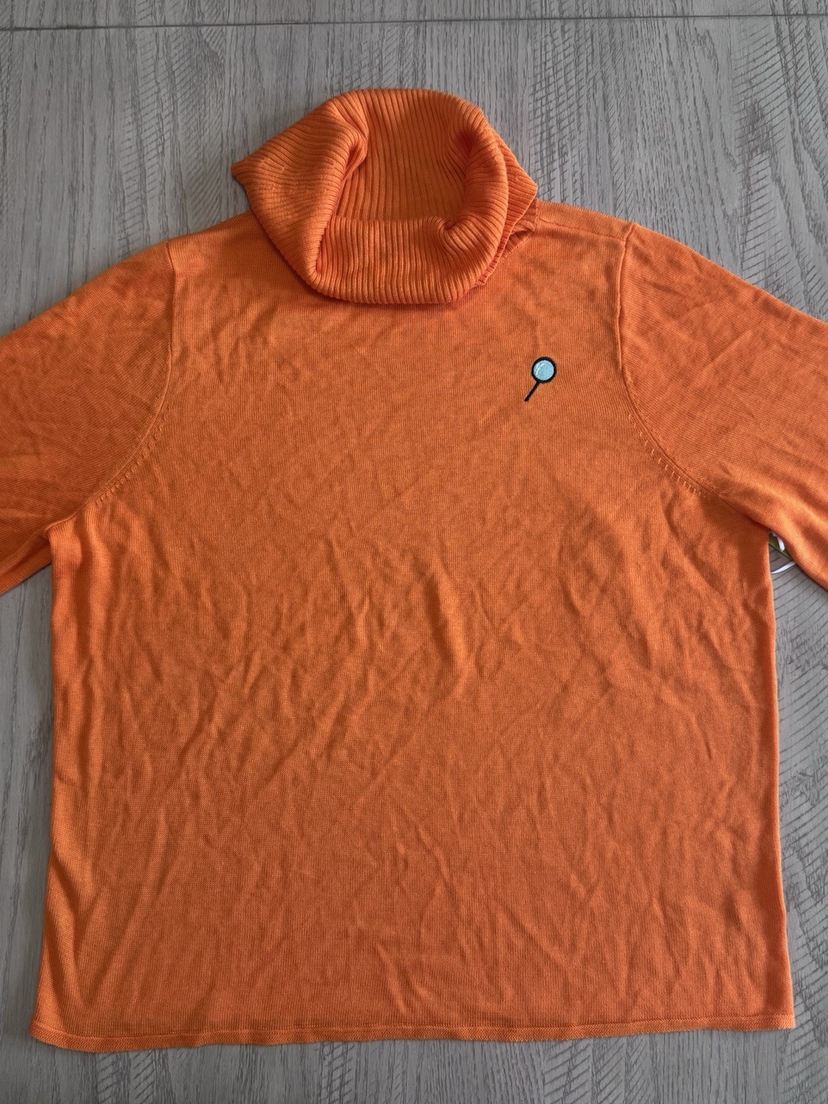 Scooby Doo Velma Turtleneck Pullover Sweater. Acrylic knit fabric. 100% acrylic.