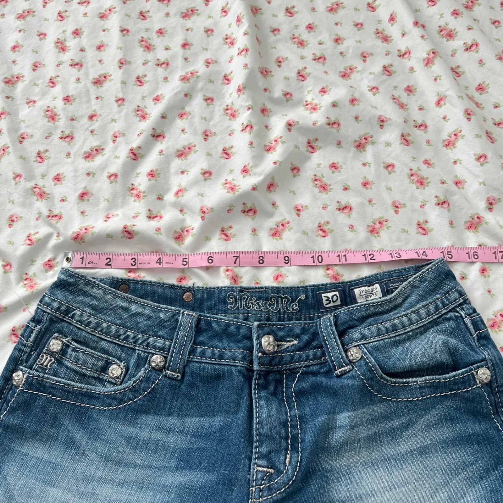 vintage y2k miss me low rise denim shorts with rose embellished back pockets