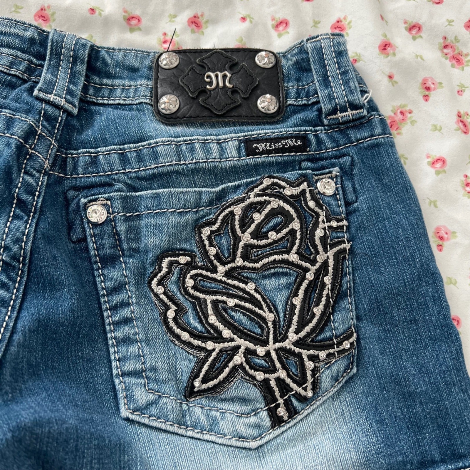 vintage y2k miss me low rise denim shorts with rose embellished back pockets