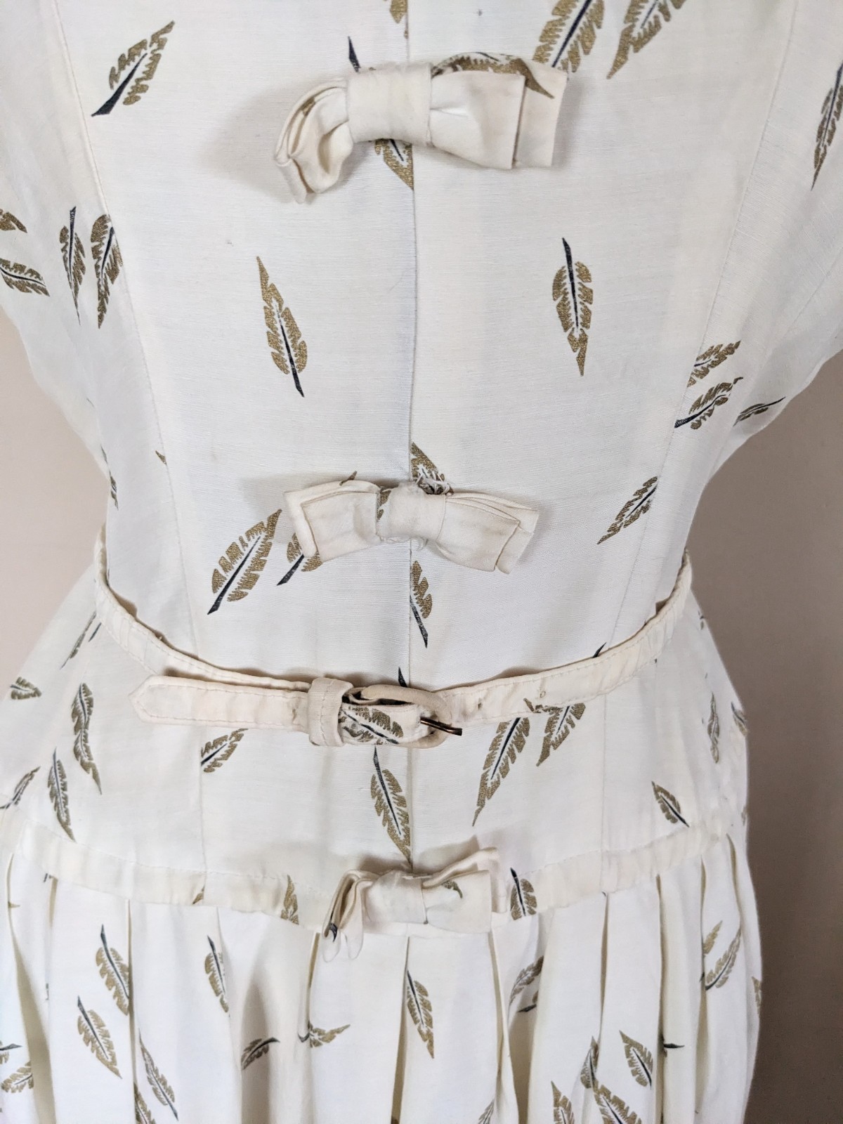 Vintage 1950s Ivory Day Dress Gold Feather Print V-Back Pleated A-Line w Belt