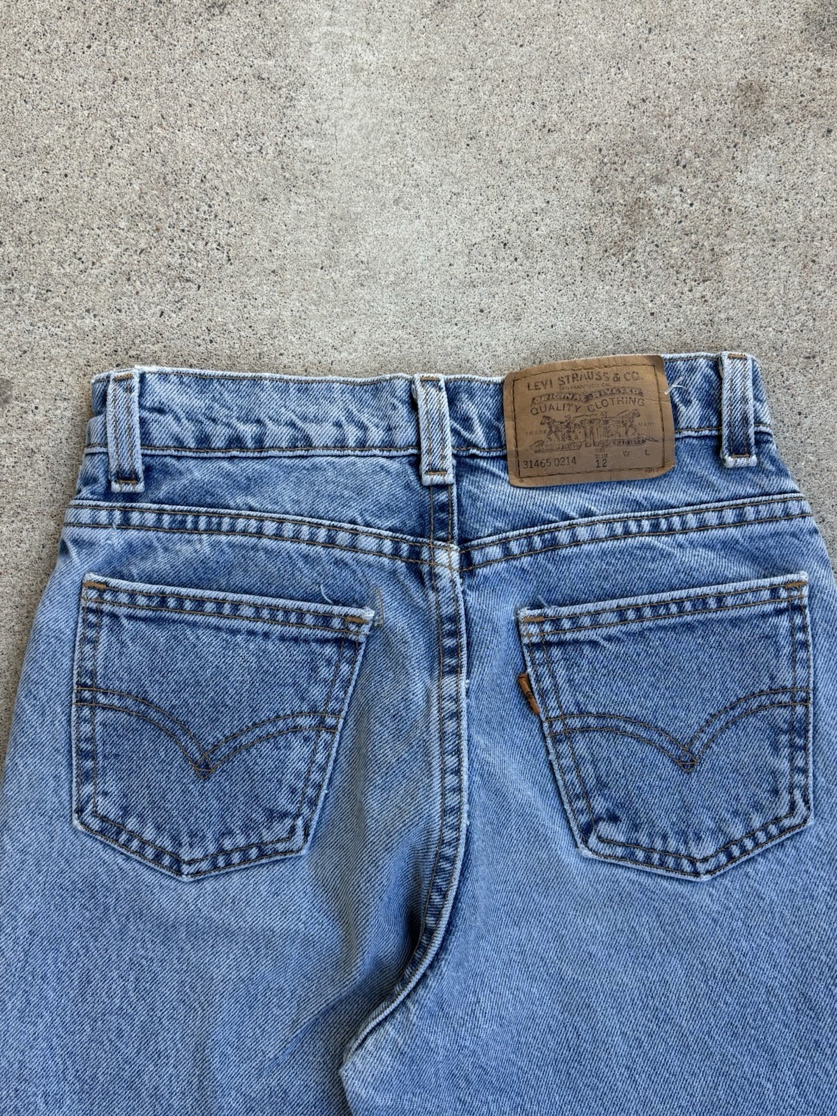 Vintage 1990s Levi’s Orange Tab Jeans. 23” Waist, 27” Inseam .