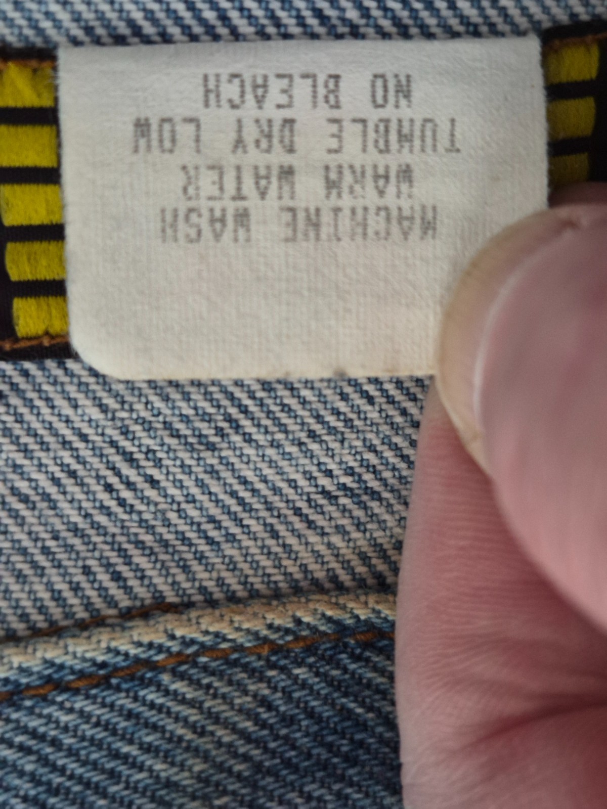 Embellished Denim Vintage 90s cropped fit vest with a light-to-medium wash