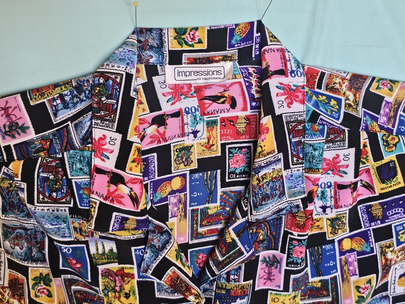 Women’s Impressions of California blouse International Stamps Print