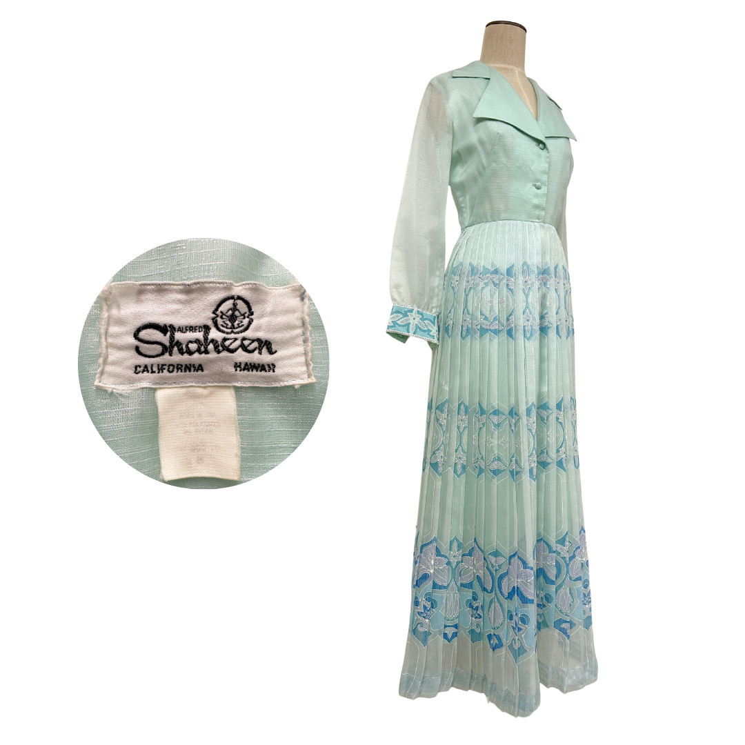 Vintage 1970s Alfred Shaheen Sheer Light Blue Polynesian Pleated Maxi Dress