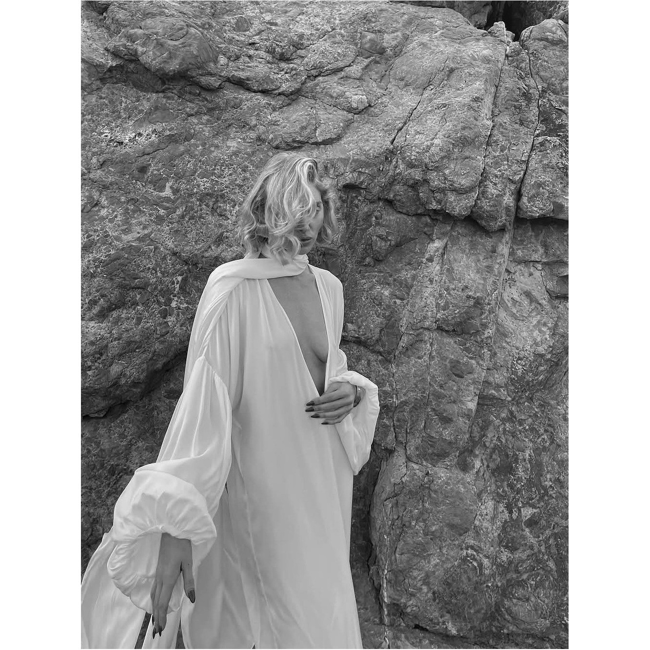 Elegant White Silk Plunging Maxi Dress with Dramatic Sleeves