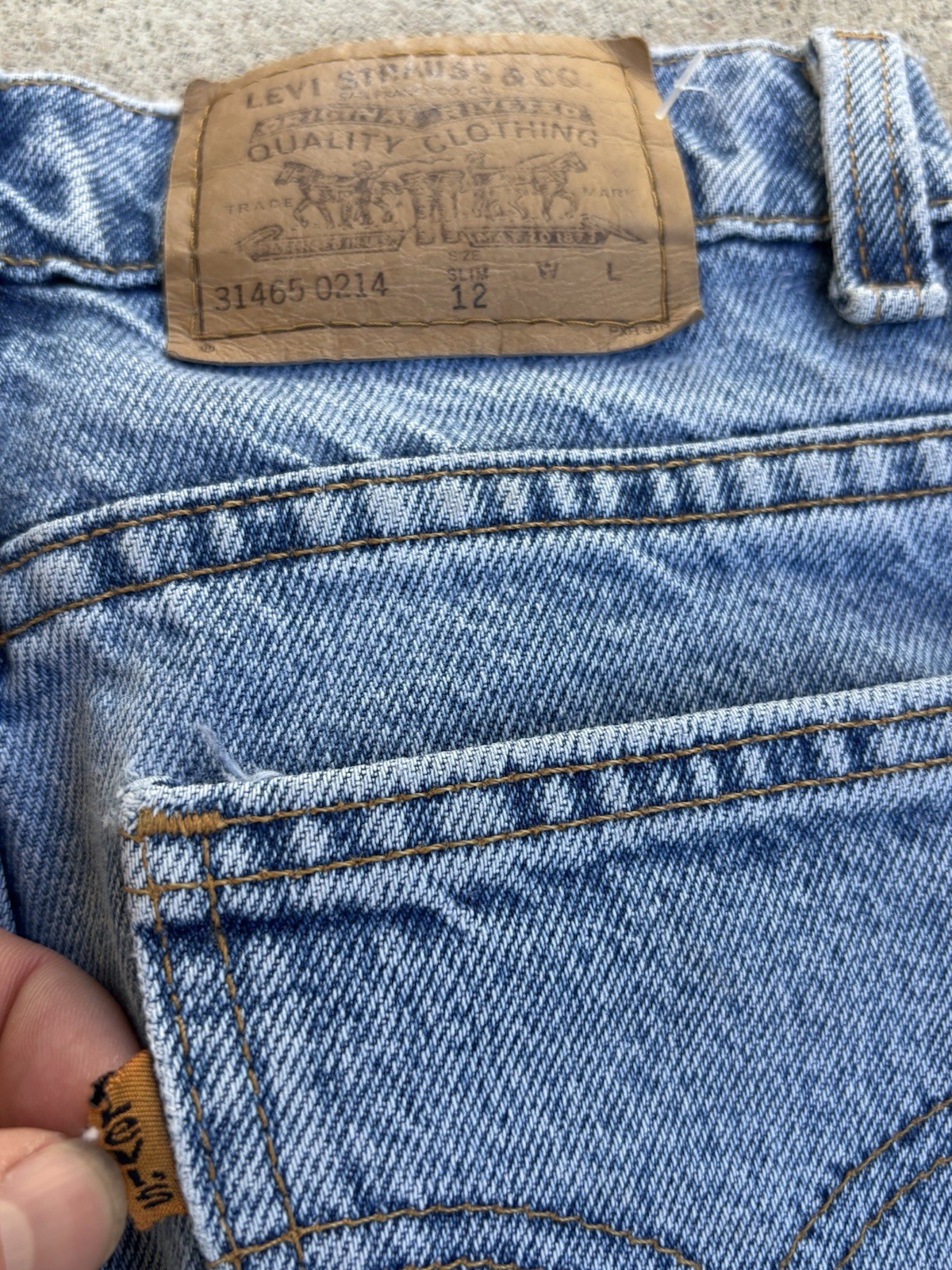 Vintage 1990s Levi’s Orange Tab Jeans. 23” Waist, 27” Inseam .