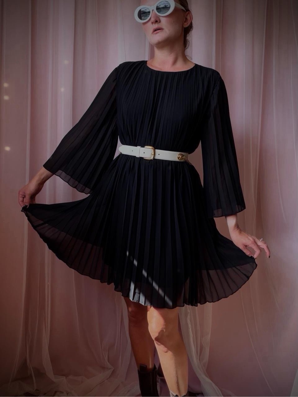 1960s-style black accordion pleated dress