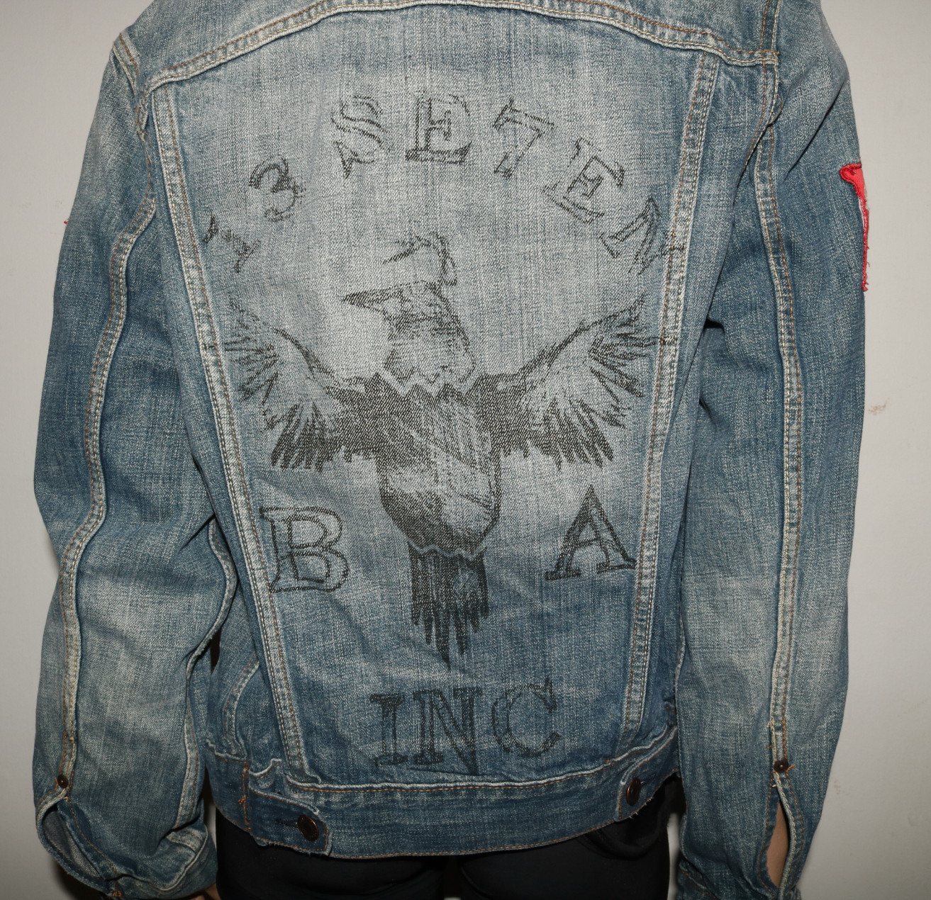 Levi’s Trucker Jacket with 13 Se7en print and various patches and distressing S