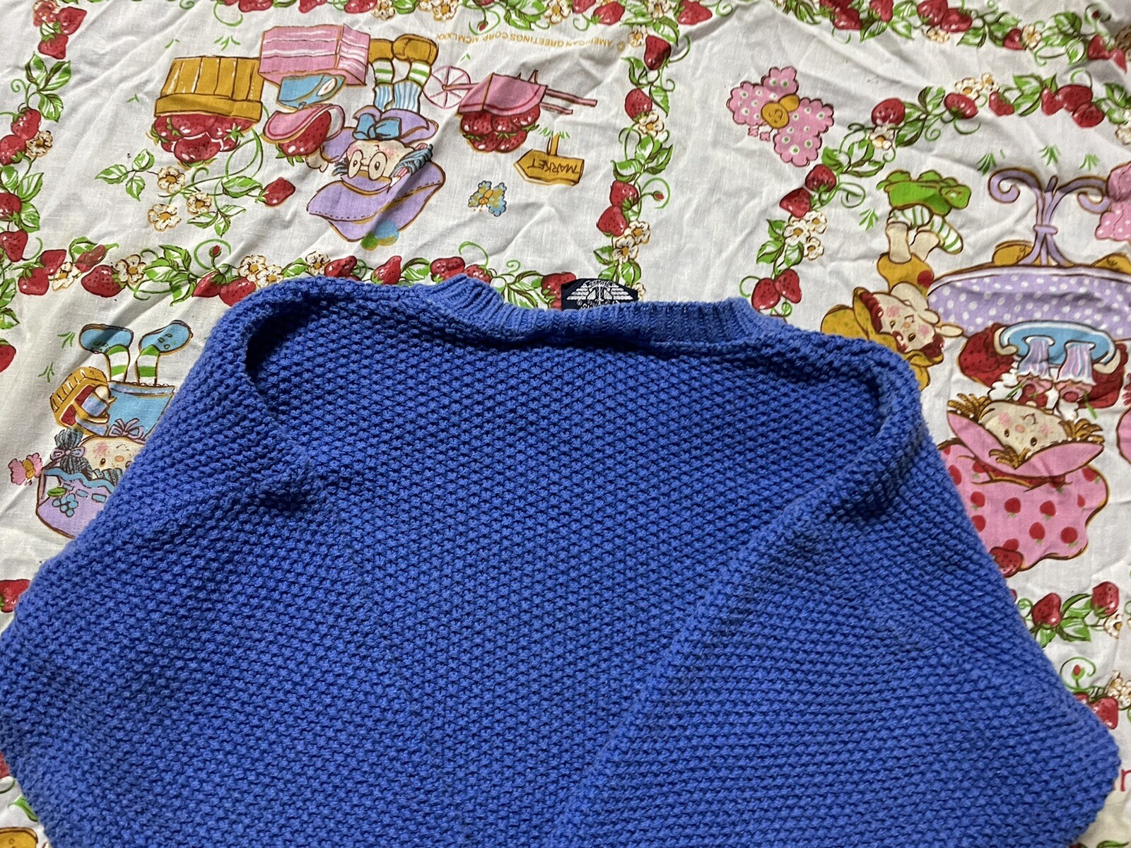 vintage 1980s dockers ladies blue knitted logo symbol sweater. Size medium