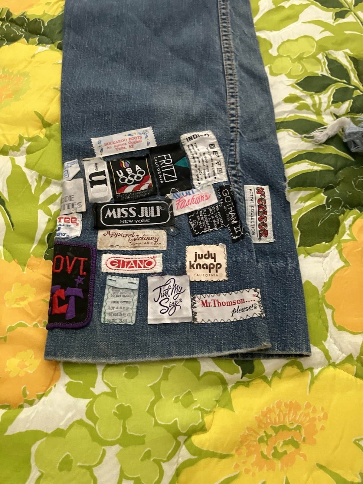 Vintage 1970’s Women’s Chemin De Fer blue jeans with patches.