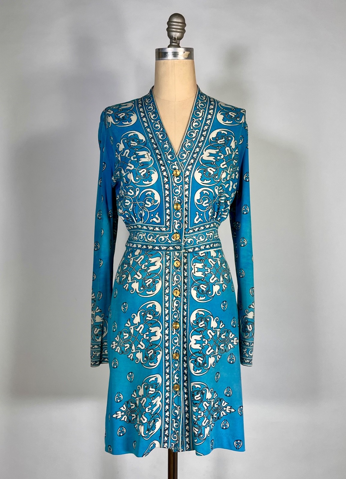Vintage 1970’s turquoise knit shirt dress w/arabesque pattern by MAURICE size XS
