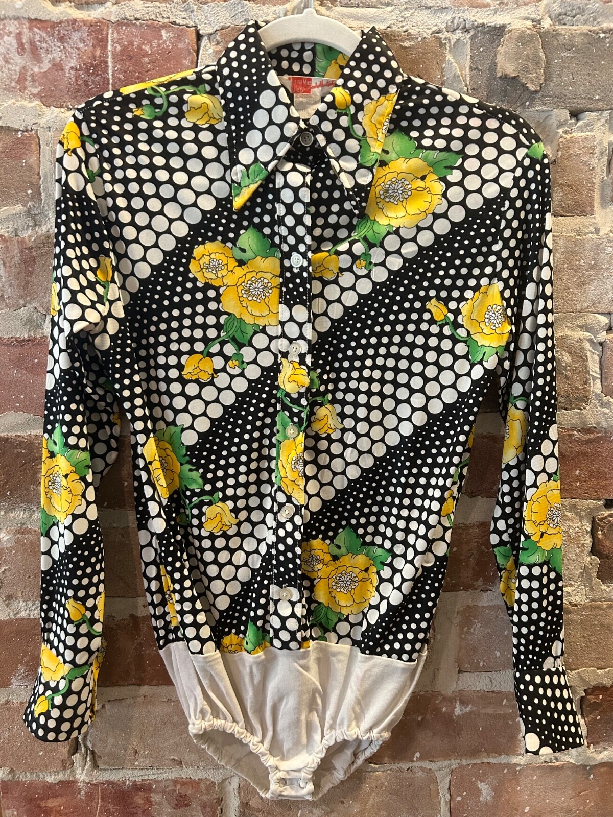 VTG 1970s black and white with yellow flowers woman’s body suit