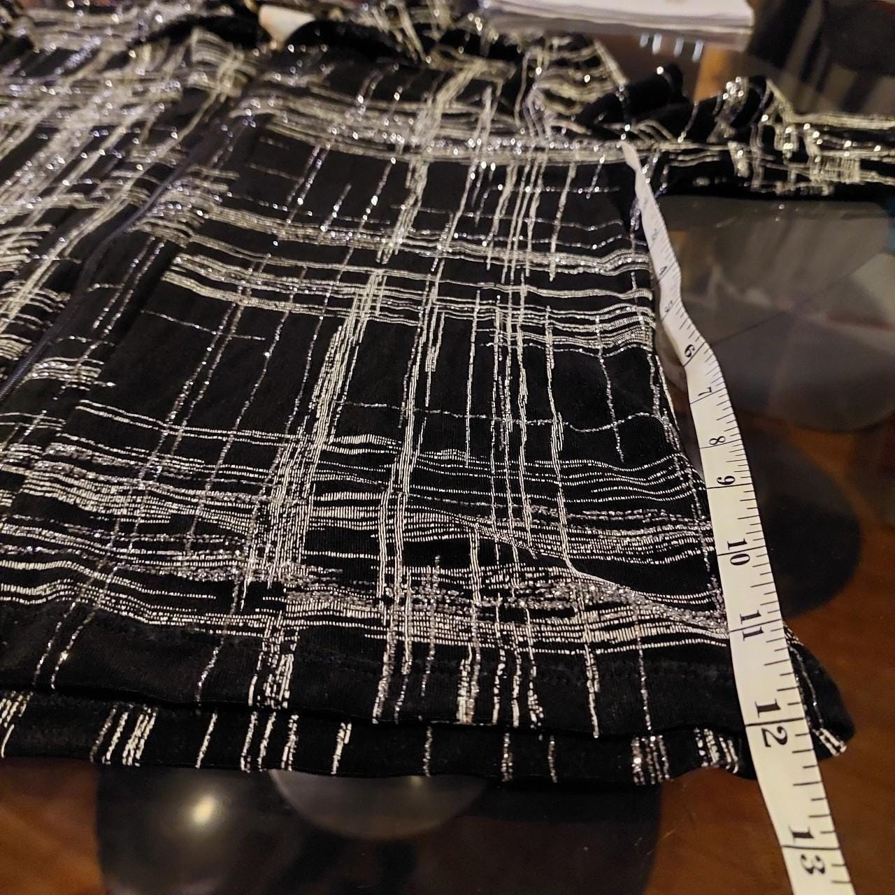 Vintage made in Canada black and silver zip up. It is slightly sheer and stretch