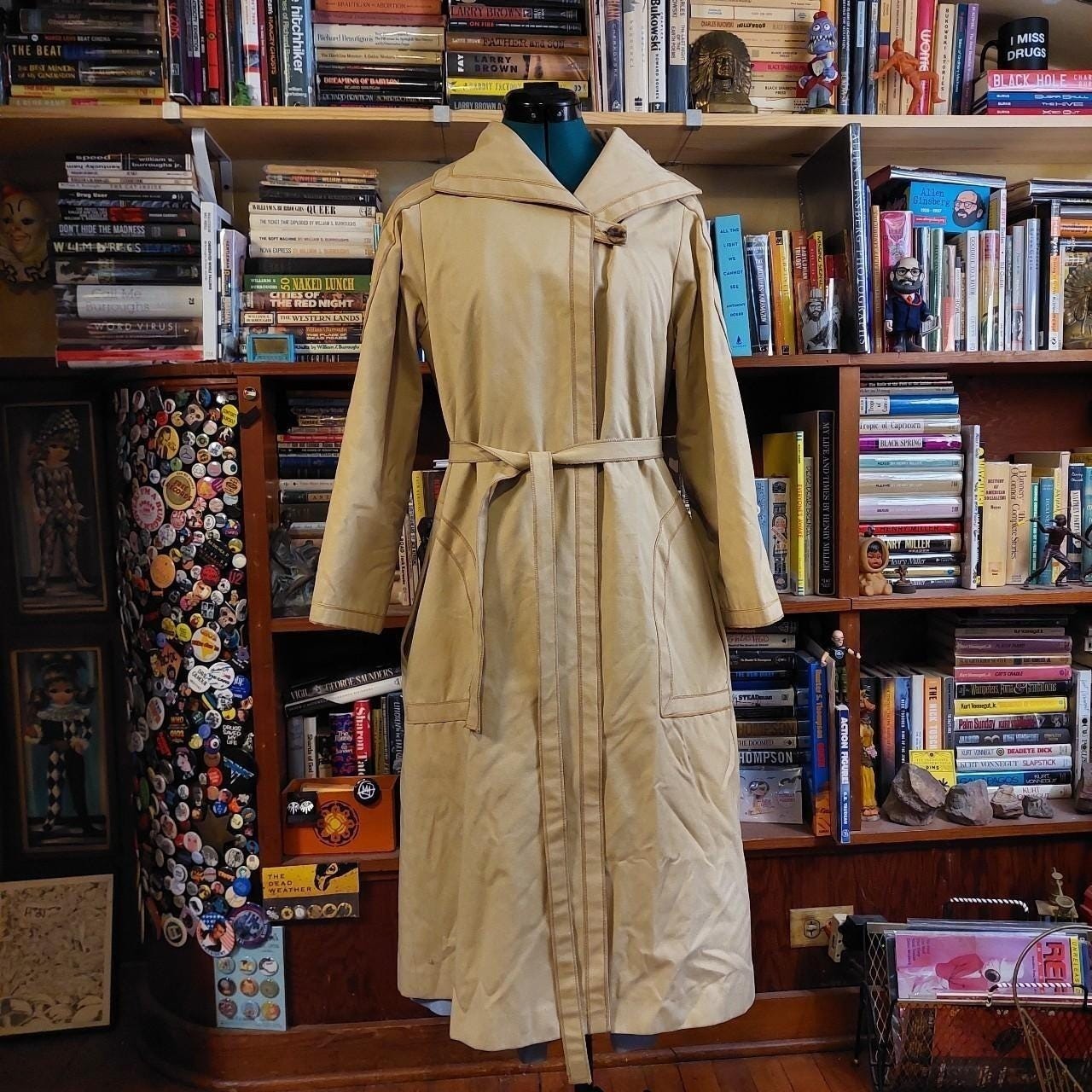 Vintage tan 1970s trench coat.
