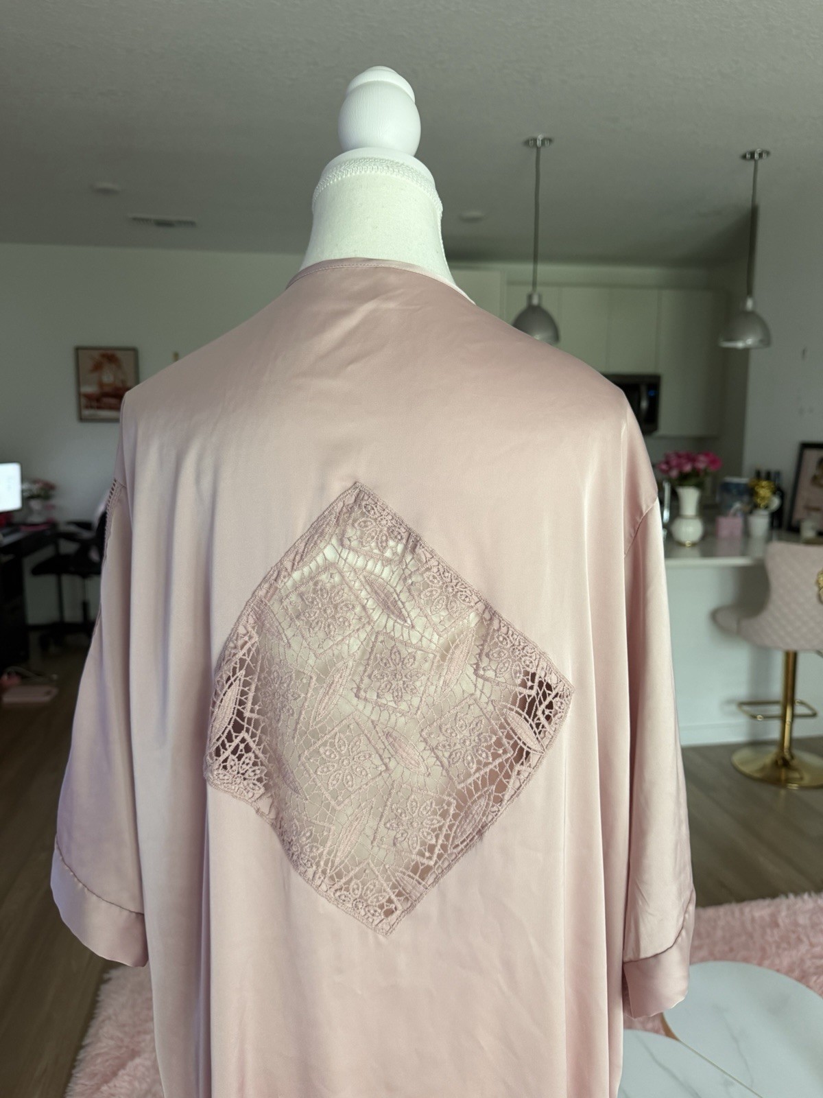 Vintage Pink satin robe with lace trim and diamond-shaped lace panel on the back