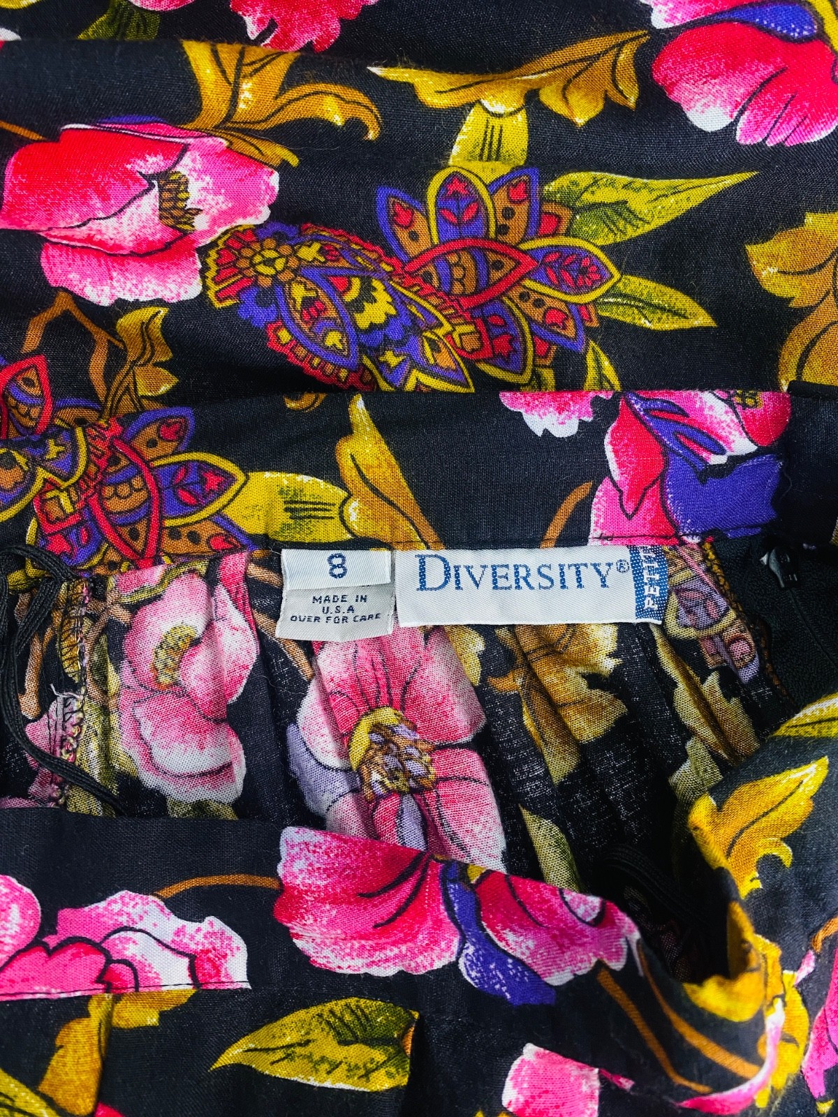 Vintage 1990s pink floral midi skirt S rayon black green pockets paisley