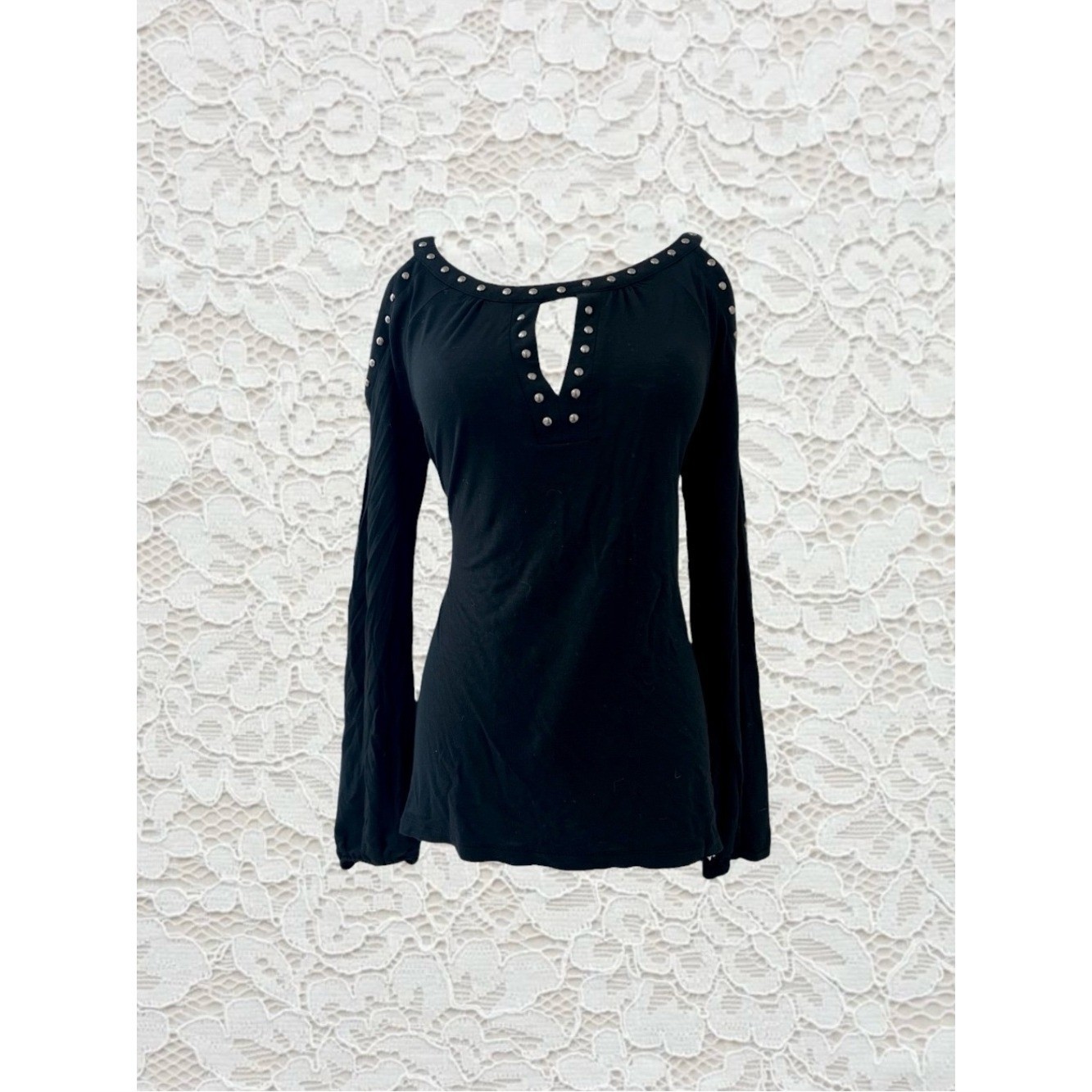 vintage black long sleeve top with silver studs along the neckline