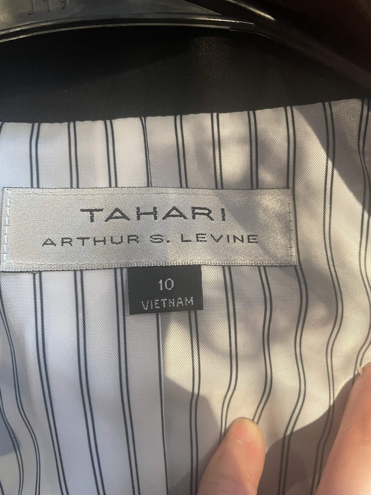 Tahari Arthur S. Levine 2 piece garment, blazer and pants. Size 10. Color black.
