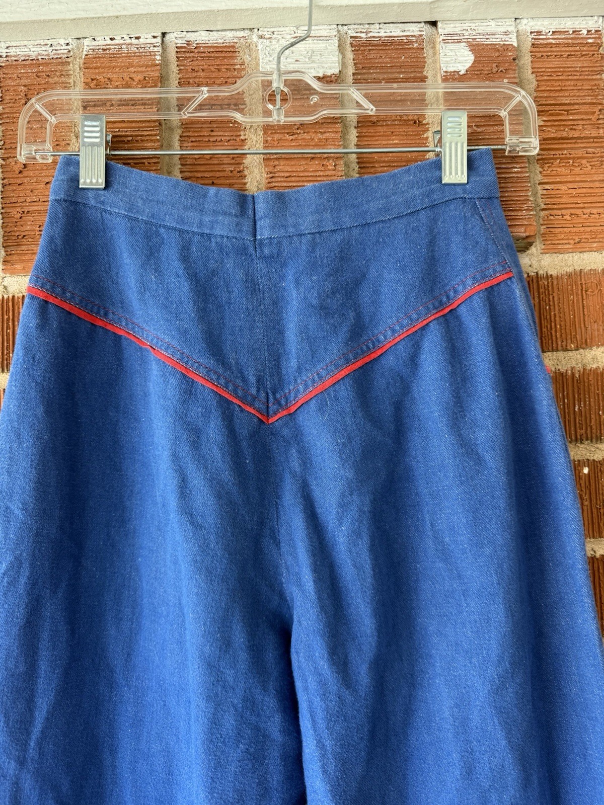 70s handmade super high rise denim flared with red trim