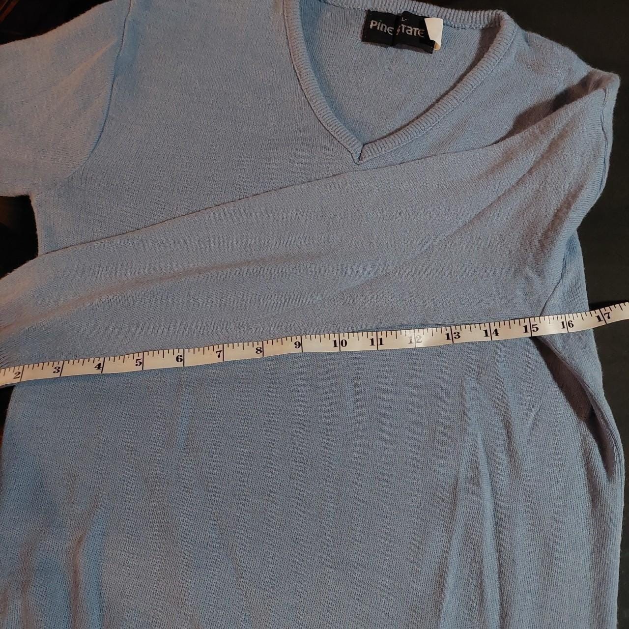 Vintage light blue V-neck sweater.