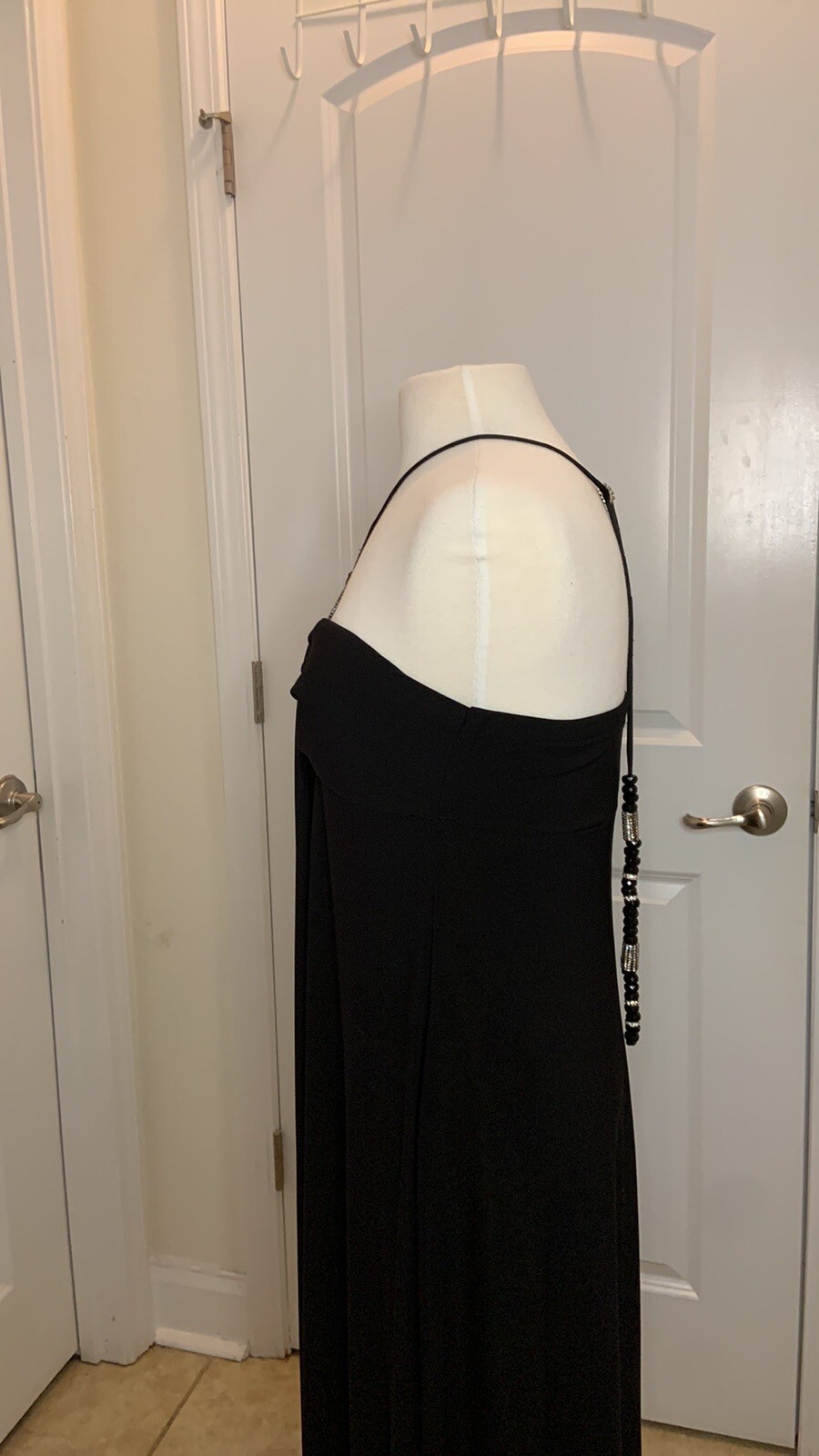 R & M Richards Vintage ladies black gown size 8. Rhinestone on tassel and broach