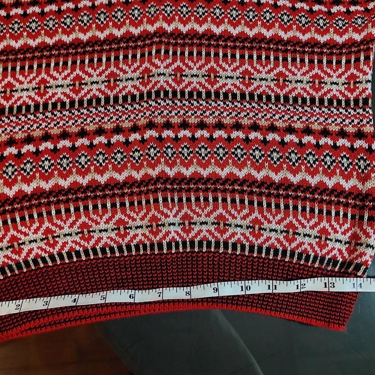 Vintage red, black, white, and tan geometric patterned sweater vest.