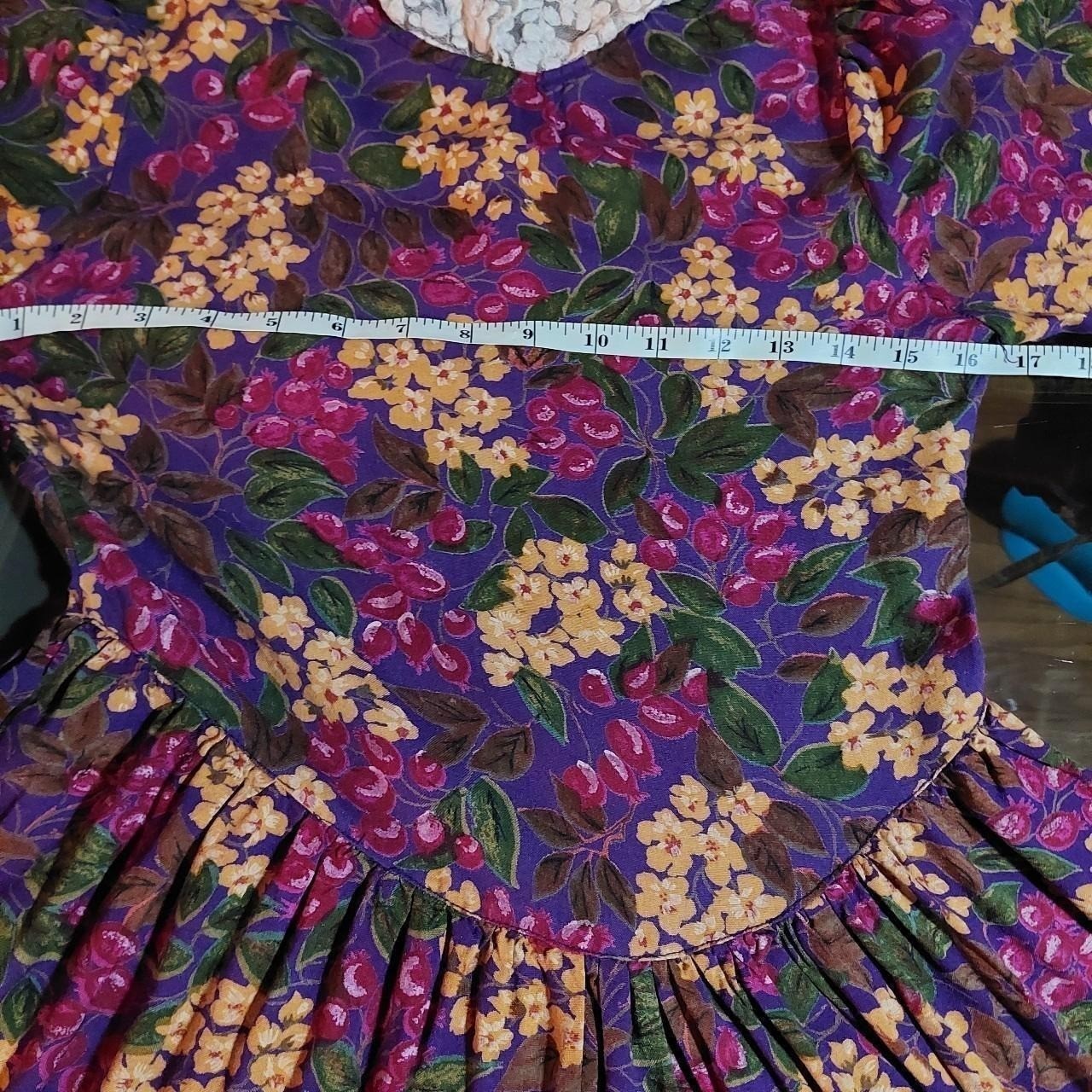 Vintage floral long sleeve dress with lace collar and bow detail.