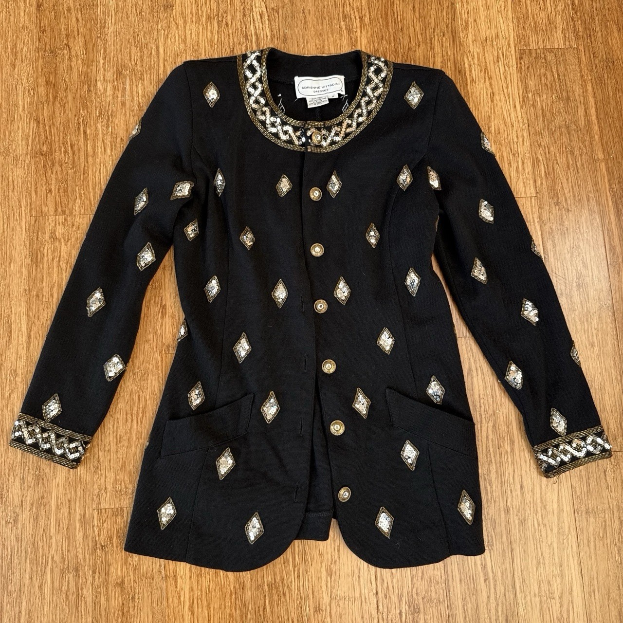 VNTG 1980s Adrianne Vittadini BLK blazer with sliver and gold embellishments.