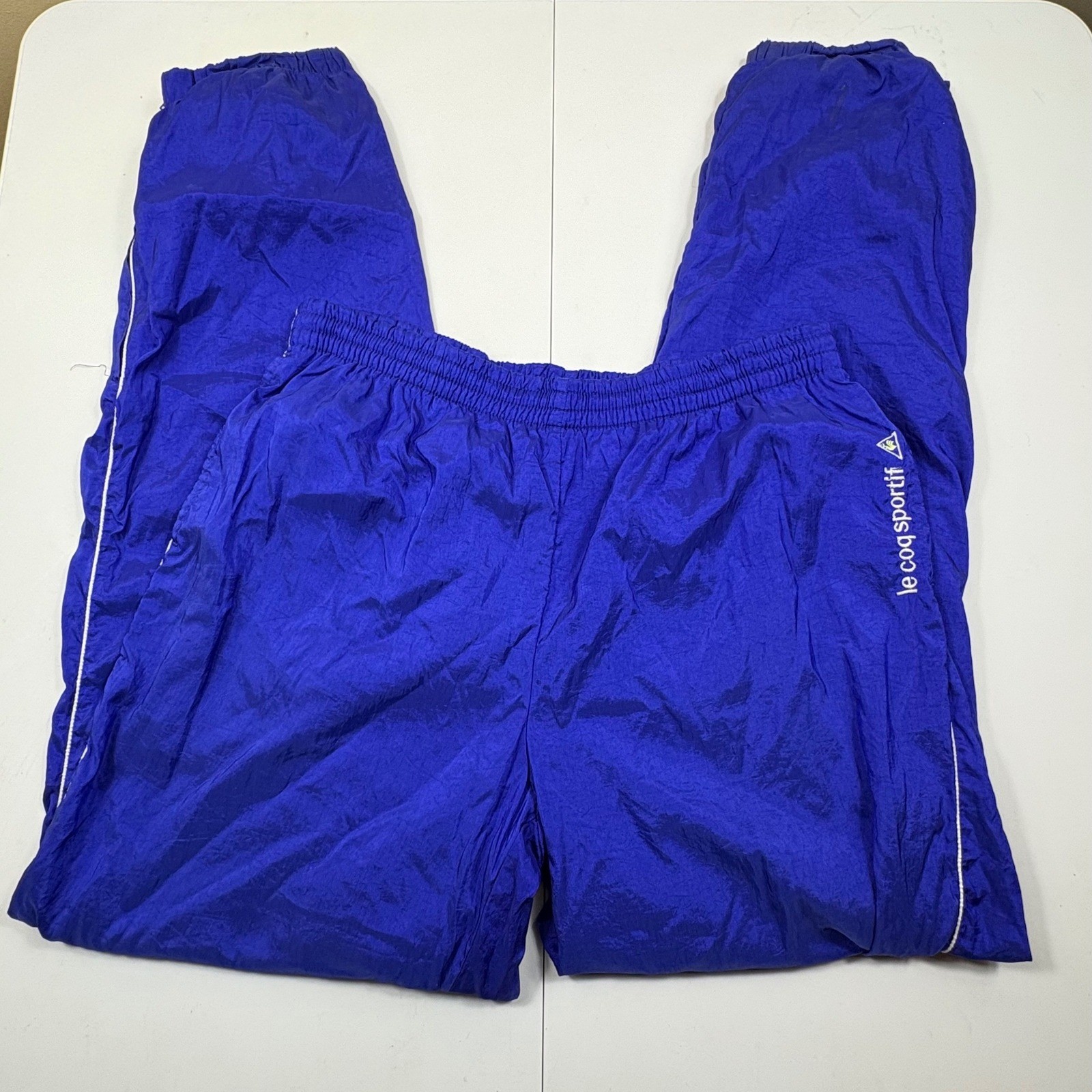 Vintage Le Coq Sportif Purple Nylon Track Pants Womens L 32″ Waist