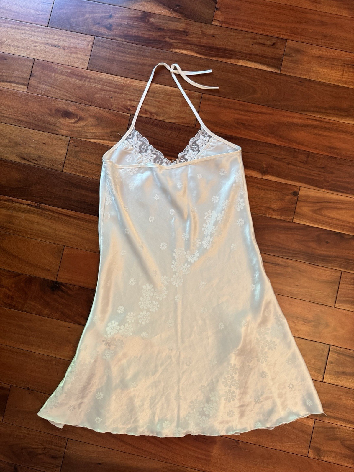 Lacy White Slip With Bow And Flower Details. Looks Like Size Large