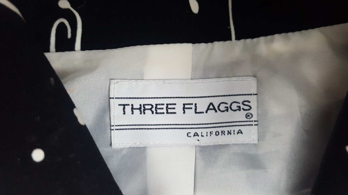 vintage 80s three flaggs black white and yellow jacket with padded shoulders xl