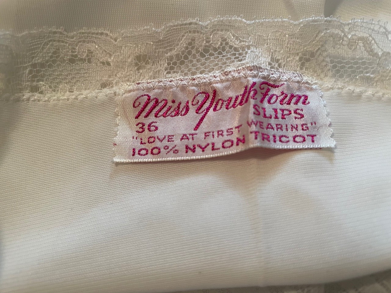 VINTAGE LINGERIE..FULL SLIP.MISS YOUTH FORM.WHITE NYLON..FRENCH LACE..SZ.36.NWT