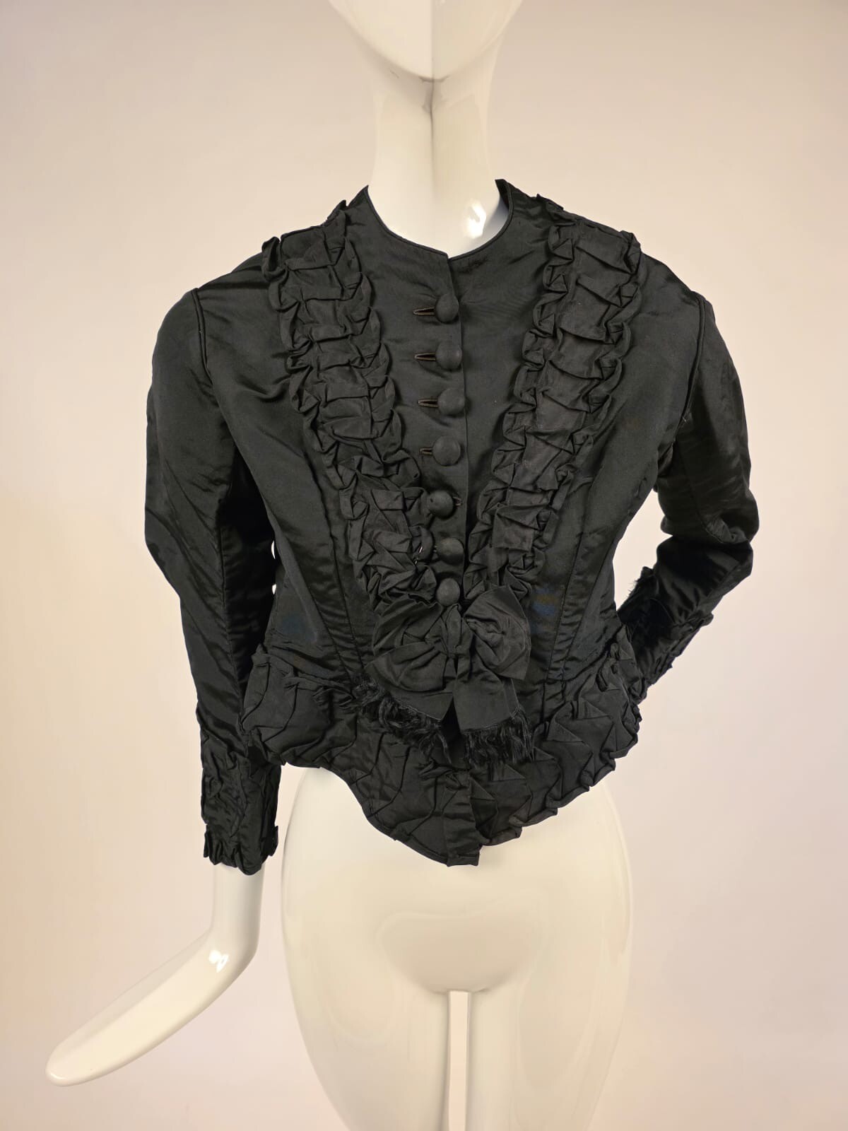LATE 1860’S BLACK SILK JACKET W RUFFLES + BOW TRIM