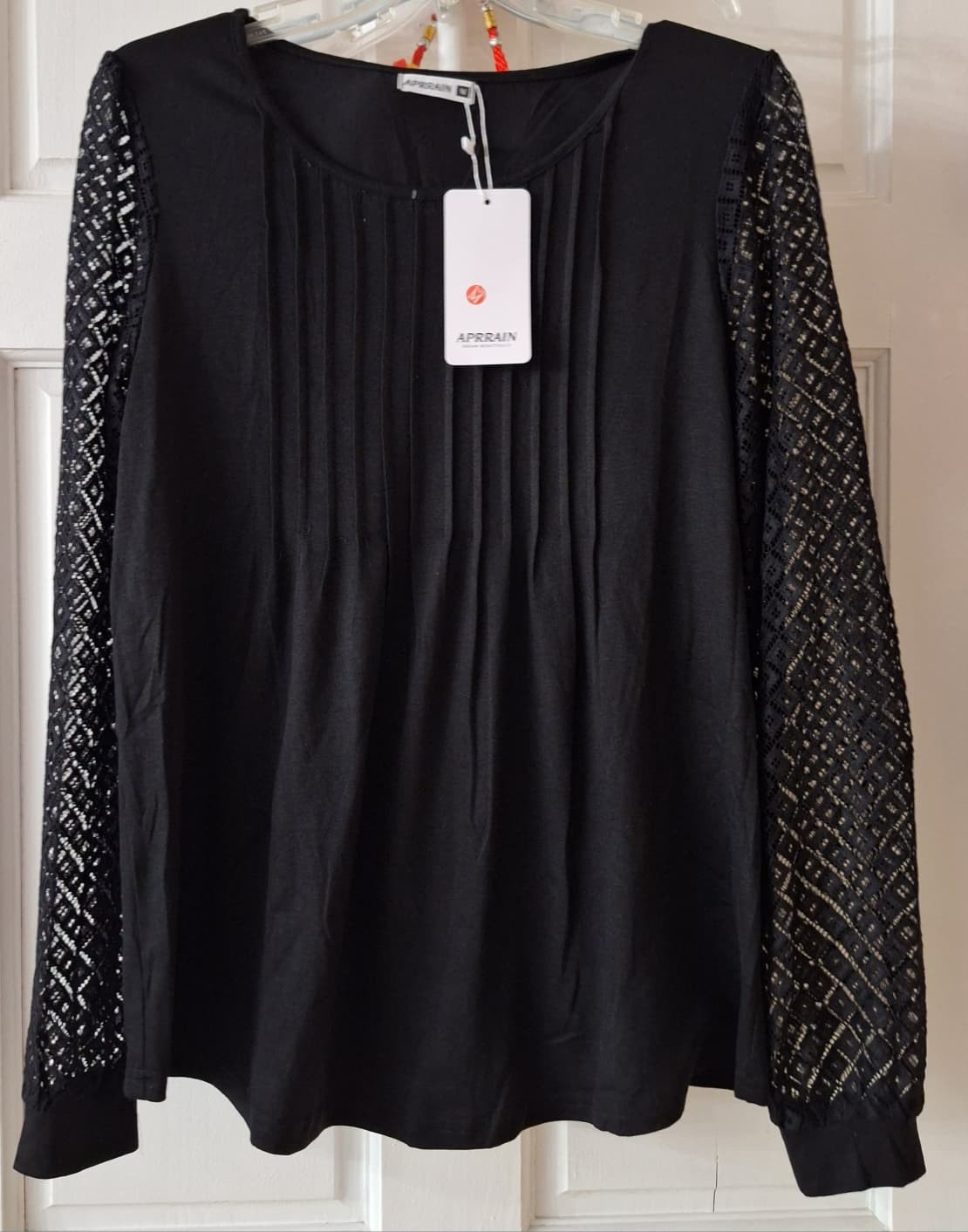 Women’s APRRAIN Black Long lace sleeves Top 60% polyester; 35% rayon; 5% Spandex