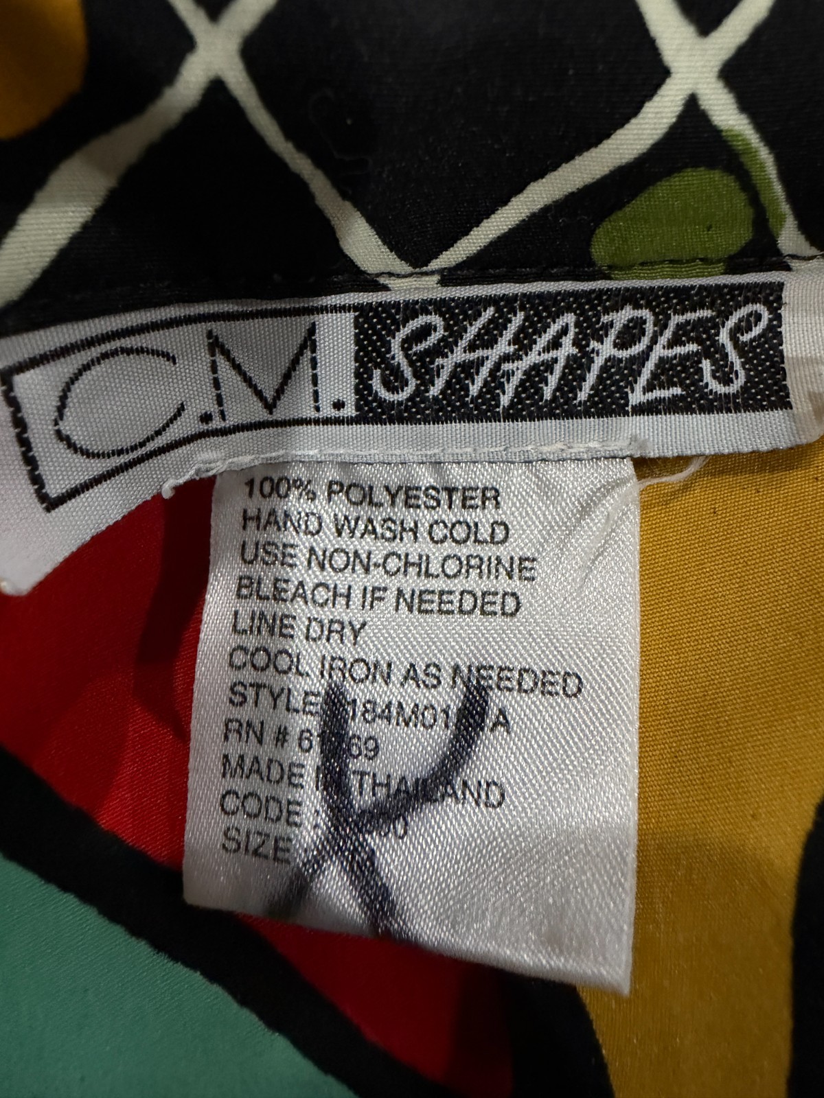 CM shapes women’s vintage 1990’s multi-colored geometric shape polyester blouse