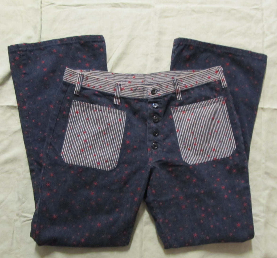 Vintage 1960’s denim with red stars & sailor button fly hip-hugger jeans/ pants