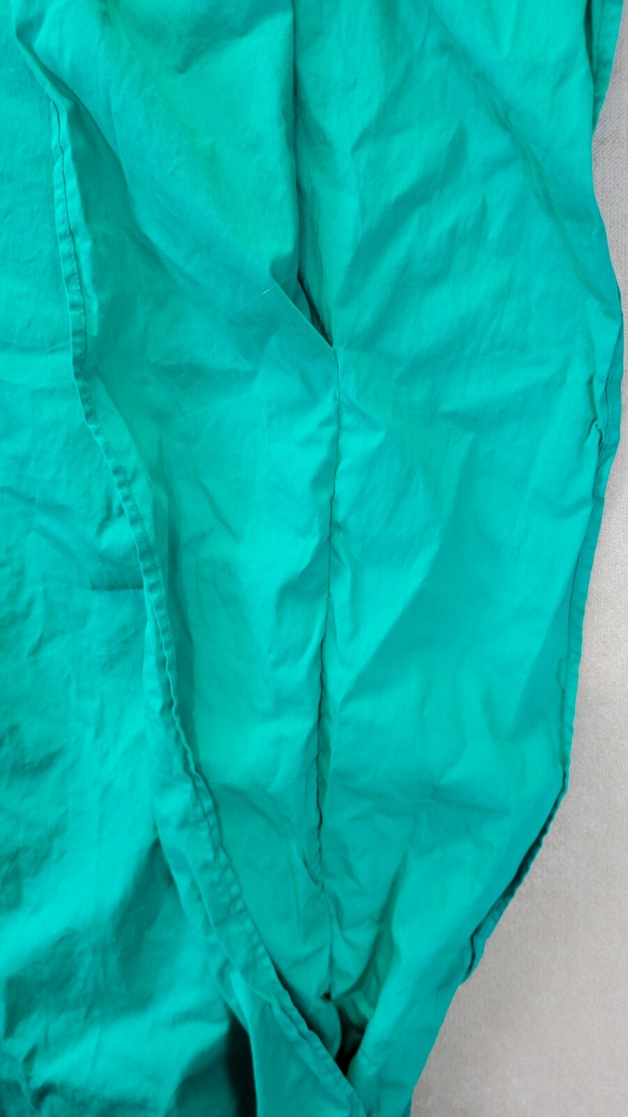 Vintage Womens Teal Muumuu With A Multi Colored Cheese Cloth Vneck Design