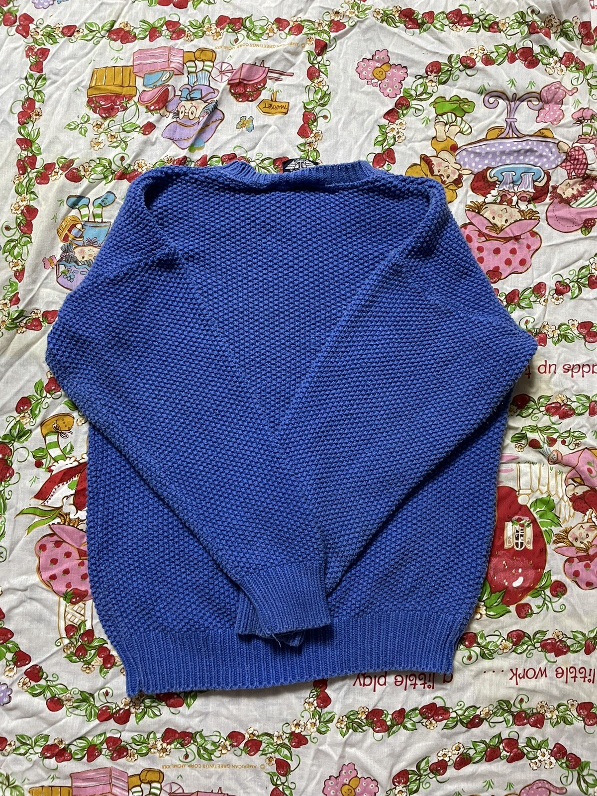 vintage 1980s dockers ladies blue knitted logo symbol sweater. Size medium