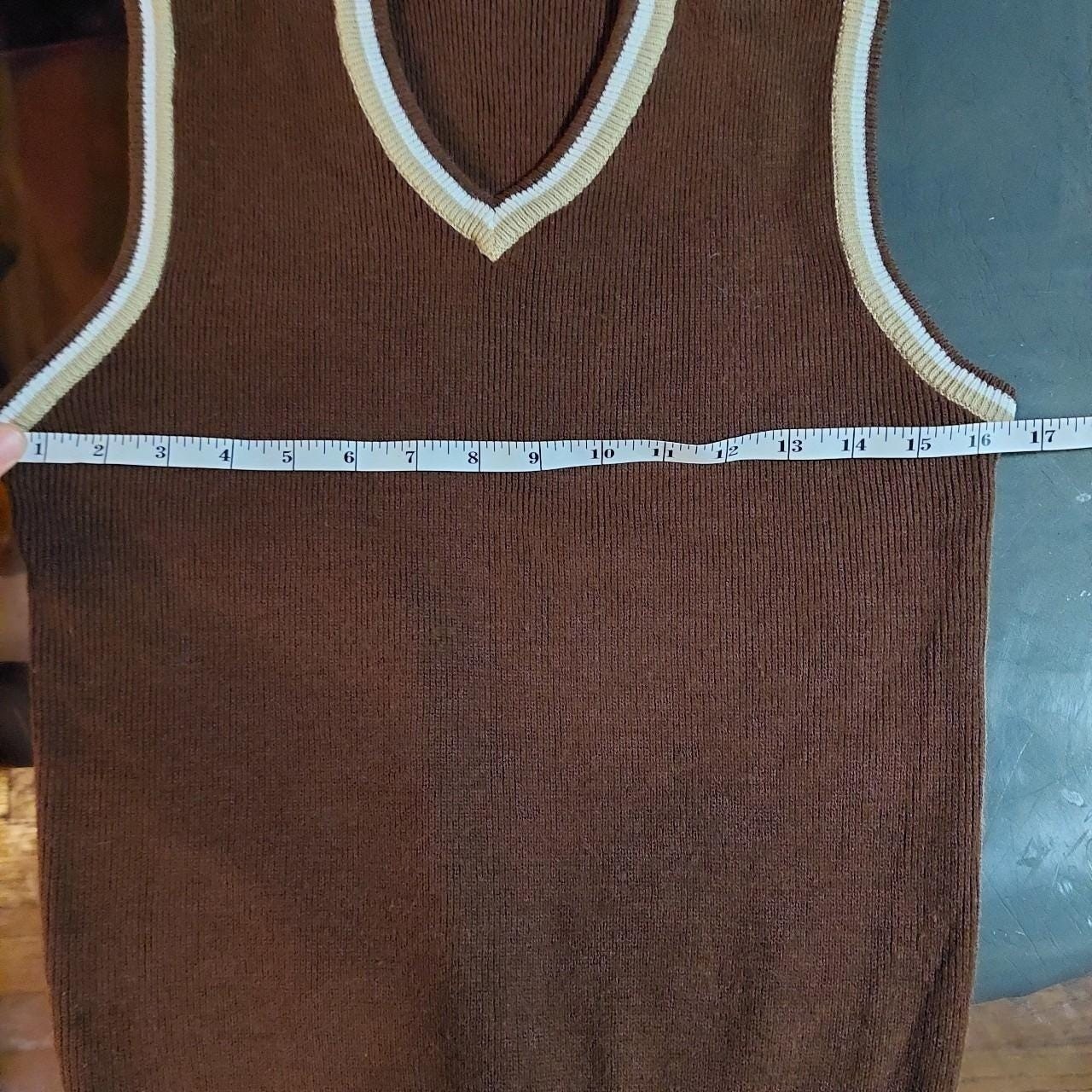 Vintage brown V-neck sweater vest with tan and white details.