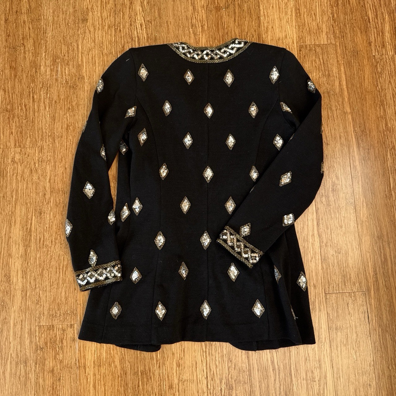 VNTG 1980s Adrianne Vittadini BLK blazer with sliver and gold embellishments.