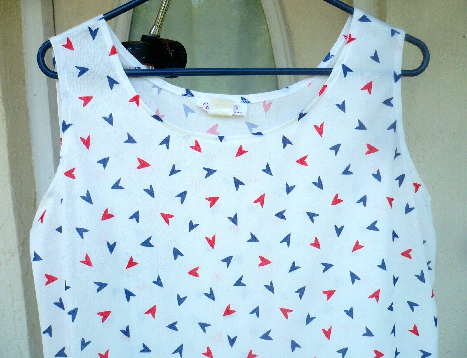 VTG 70S M L CAROL HENRY WHITE POLY KNIT BLOUSE SLEEVELESS RED BLUE ARROW PRINT
